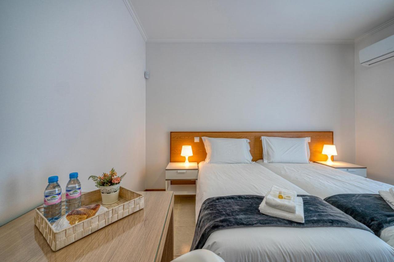 Central Suites Arouca Bagian luar foto